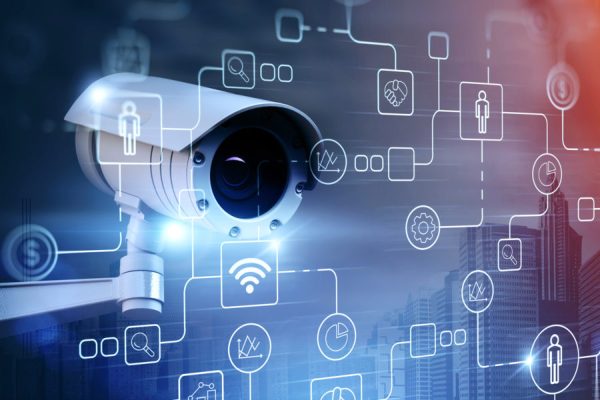 Surveillance street camera in city and icons
